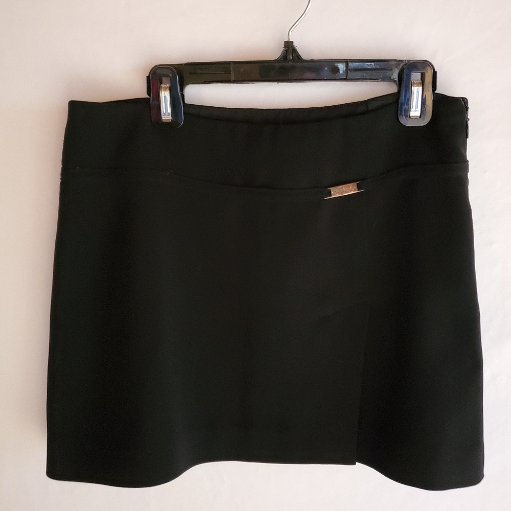 Bebe Black mini skirt